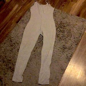 Fashion Nova grey jumpsuit/ romper size large